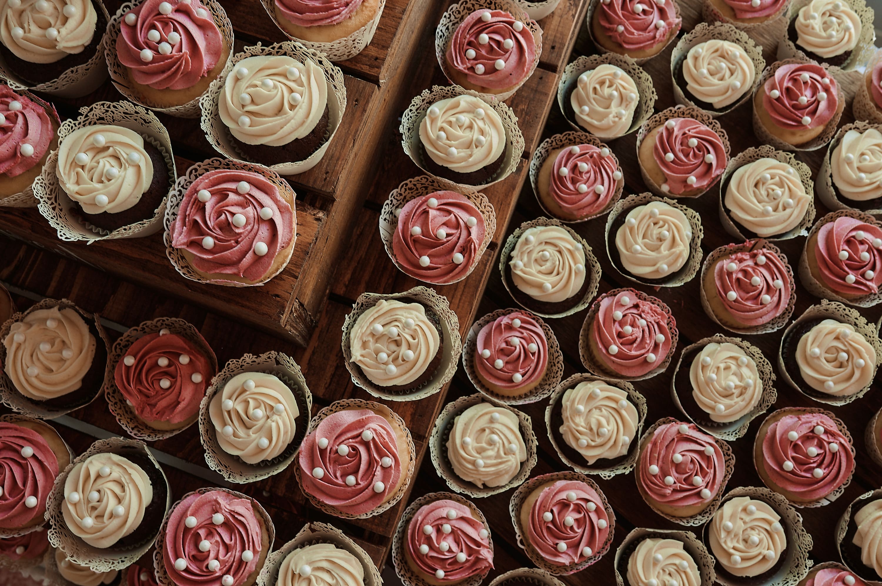 Detailed shot of a cupcake tower at a Boston wedding dessert table
